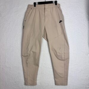 293. Nike Dri-Fit Utility Jogger Pants Beige Black Logo Size L